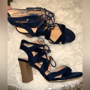 Navy blue lace up heels.